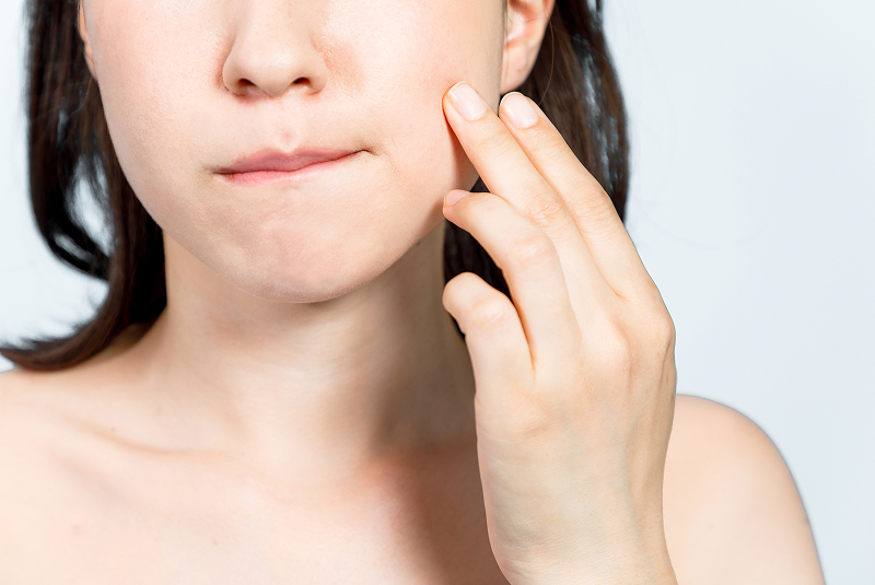 woman testing for tmj